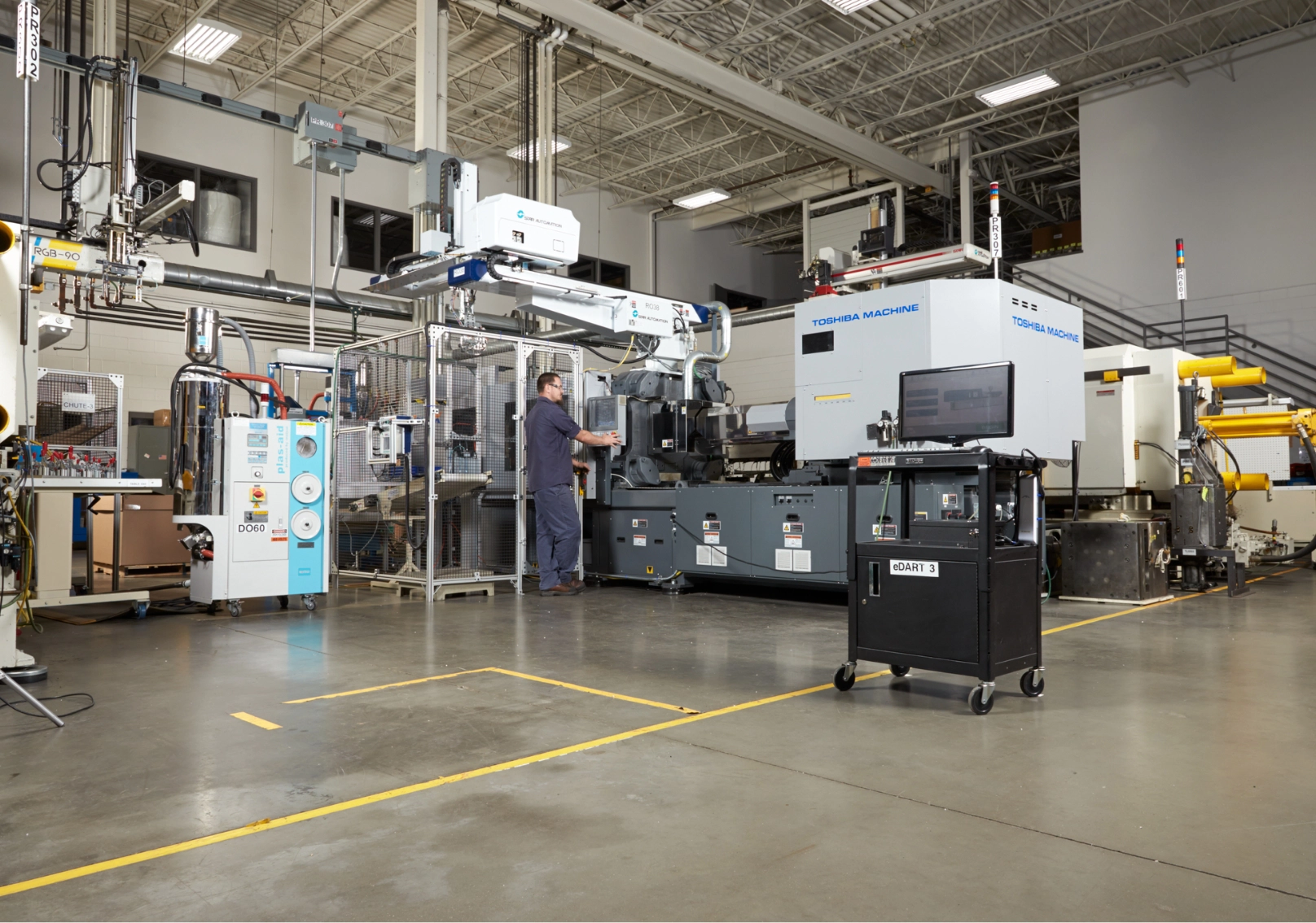 New Berlin Plastics injection molding press
